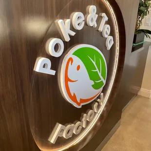 a sign for poke and tea