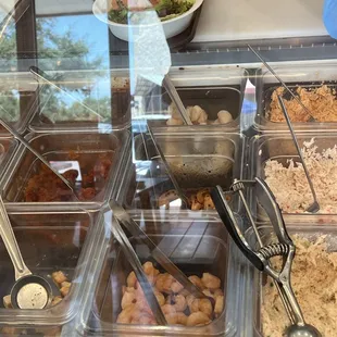 panning to show other fresh seafood proteins &amp; ingredients for premium-bowl-building-efficacy