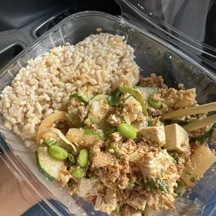 Tofu, cucumbers, pineapple, edamame, onions, with sauce #6 next to brown rice