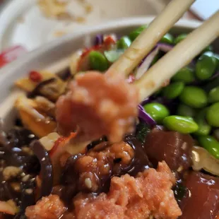 chopsticks in a bowl of food
