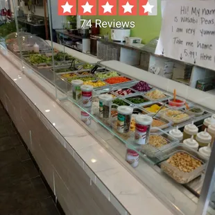 Here is the spread of assorted ingredients that you pick and they build.