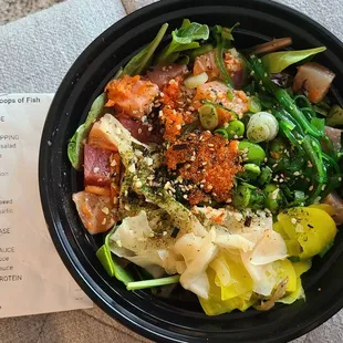 Medium Poke Bowl comes with 3 proteins. I chose: salmon, tuna, albacore. Please see receipt to the left of bowl for more details.