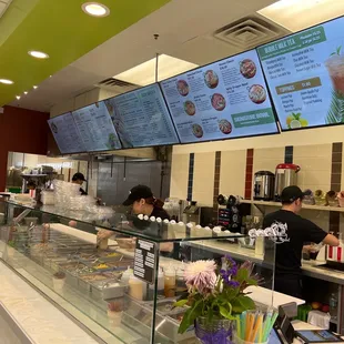 customers ordering food at the counter