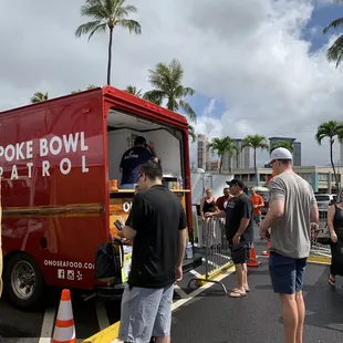 people getting ready to board the truck