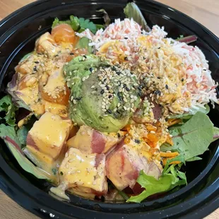 Salad bowl with regular tuna, salmon, and "crab", with spicy mayo, mild poke sauce, and avocado. Good dependable meal.
