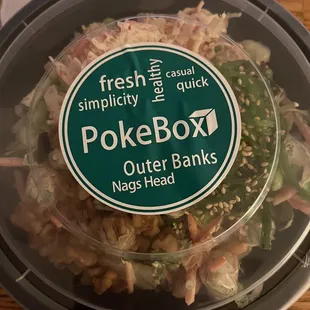 a salad in a plastic container