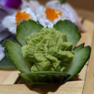 a pickled cucumber on a cutting board