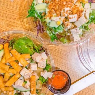 two bowls of food on a table