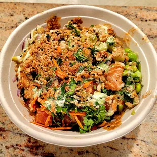 Build Your Own Bowl  with marinated tuna, spicy tuna, spicy salmon, and 11 other ingredients.