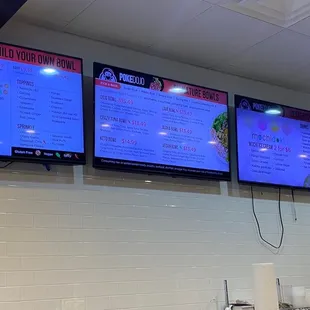 menus on the wall of a restaurant