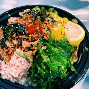 a plate of food with rice and vegetables