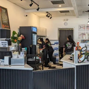 customers at the counter of a fast food restaurant