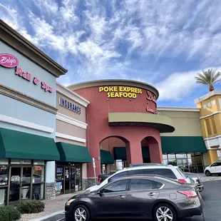 a car parked in front of a store