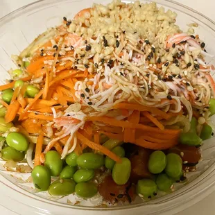 Create your own Poke bowl with marinated tuna, brown rice, cucumber, carrot, edamame, crab, sesame seeds &amp; tempura flakes
