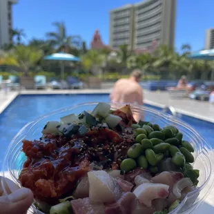 Ahí and hamachi over salad at our hotel pool.