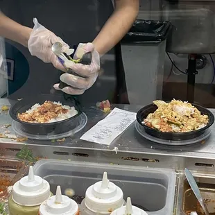 a man preparing food in a kitchen