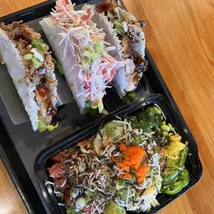 Custom Hawaiian Poke plate and Makai Crispy Rice tacos (Lolo pork, abrí Hei chicken and  California I Ayeee Taco). Bomb