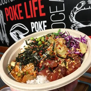 Tuna and Salmon topped with nori, edamame, cabbage, and pineapple. :)