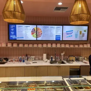 a woman ordering food at the counter