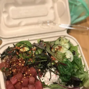 Half and half (half brown rice and half salad) with classic ahi tuna and ahi tuna with the house sauce. Delicious