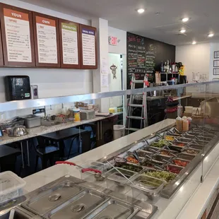 a buffet with a variety of food items