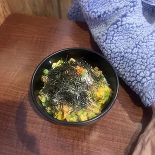 a bowl of food on a table