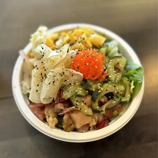Large bowl w soba noodles n salad as a base  Proteins: yellowtail, ahi tuna, octopus, clams, albacore