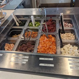 a variety of foods in a buffet