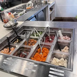 a variety of food in a buffet