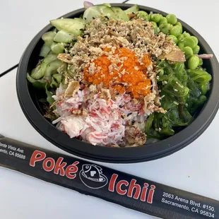 a bowl of food and a roll
