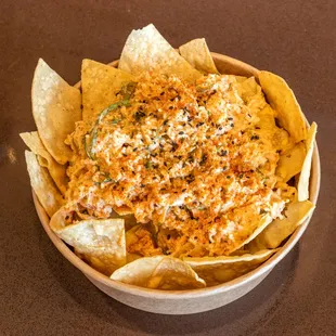 Chips &amp; Dip. Tortilla chips, three scoops of crabmeat, seaweed salad, Ohana + Maui sauce.