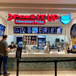 a man standing in front of the counter