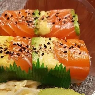 a sushi dish in a plastic container