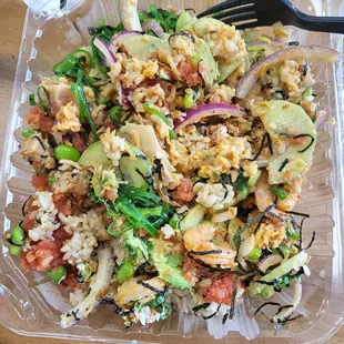 Brown rice, krabmeat, avocado, cucumber, red onions, spicy tuna, albacore, spicy shrimp, house spicy sauce, spicy mayo, ginger.