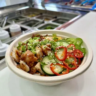 Succulent, boneless chicken thighs marinated in a secret blend of spices coated in a light, crispy tempura batter, fried.