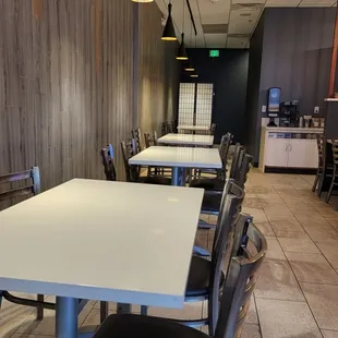 a table and chairs in a restaurant