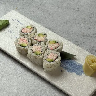 a piece of sushi on a plate