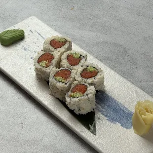 a piece of sushi on a plate