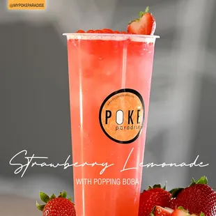 a pink drink with strawberries