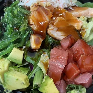 Ahi tuna, seared salmon, seaweed salad, crabmeat salad, and avocado with half/half (rice and spring mix).