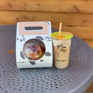 a drink and a box on a table