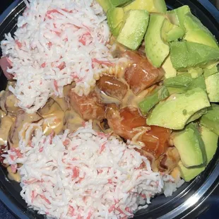 Poke Bowl with rice, salmon, tuna, eel sauce, extra spicy mayo, avocado and double crab salad. The flavors are so wonderful.