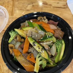 a bowl of stir fried vegetables