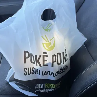 a plastic bag in the back seat of a car