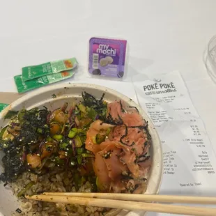 Poke Regular Bowl with rice, salmon and spicy salmon and  a huge amount of toppings, drink and Mochi
