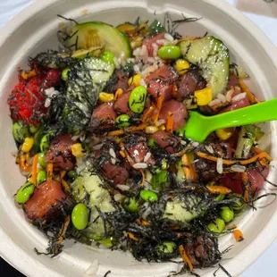 Make your own poke bowl- ahi tuna, edamame, brown rice, cucumber, corn, eel sauce, nori flakes, and masago