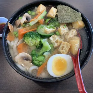 Vegetable Udon add egg. The broth is amazing and so is the chili oil. Definitely worth a try!