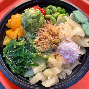 Poke bowl, with tuna, spicy tuna, and salmon