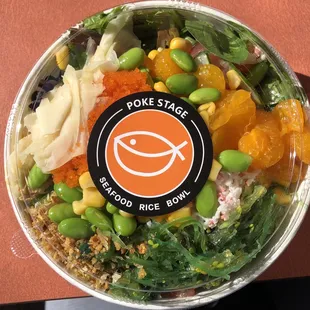 a bowl of poke stage salad