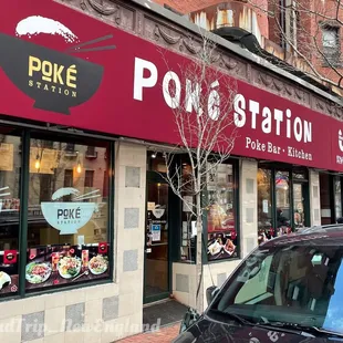 a car parked in front of the restaurant